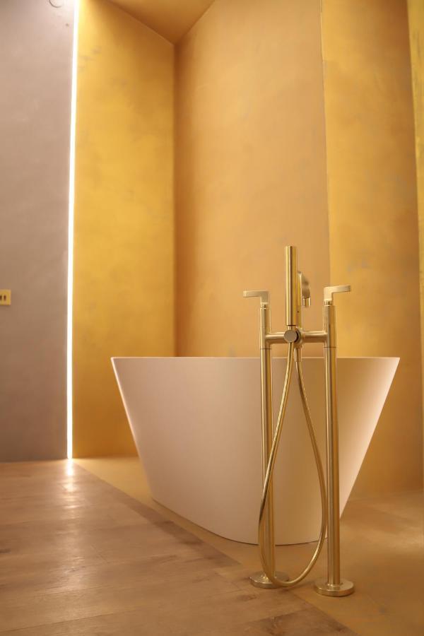 The Veil Hotel Астана Экстерьер фото A modern freestanding bathtub