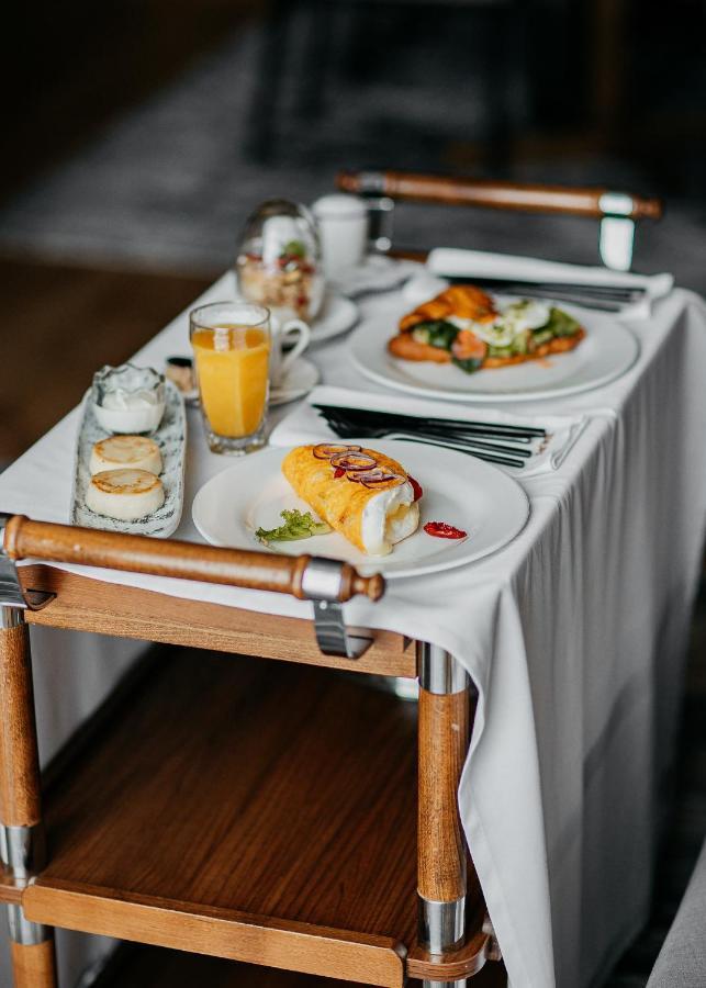 The Veil Hotel Астана Экстерьер фото Room service