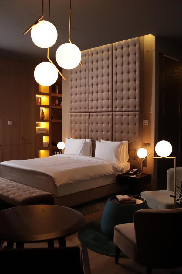 The Veil Hotel Астана Экстерьер фото A bedroom at the hotel
