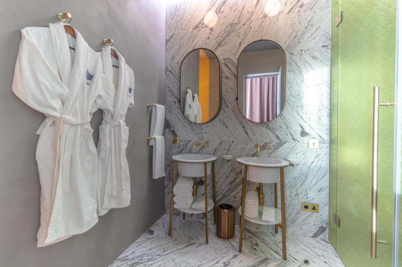 The Veil Hotel Астана Экстерьер фото Bathroom