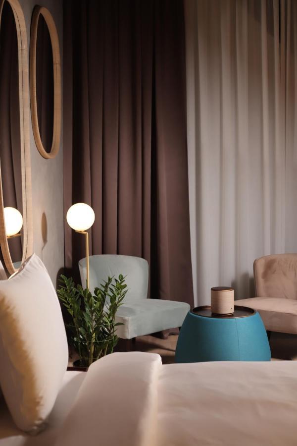 The Veil Hotel Астана Экстерьер фото Curtains in a living room