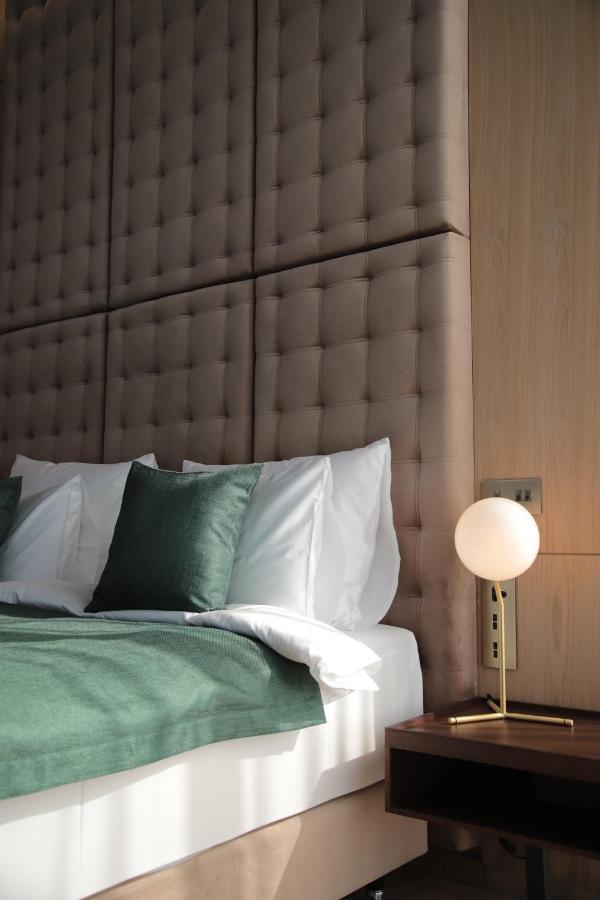 The Veil Hotel Астана Экстерьер фото A wall-mounted light